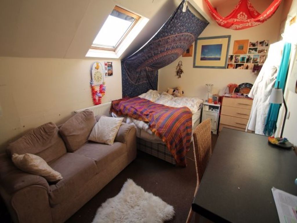 Property photo 3 of 14 A Cozy Living Room With A Comfortable Sofa, A Wind...