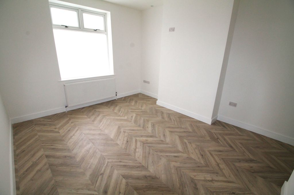 Property photo 3 of 12 Living Room