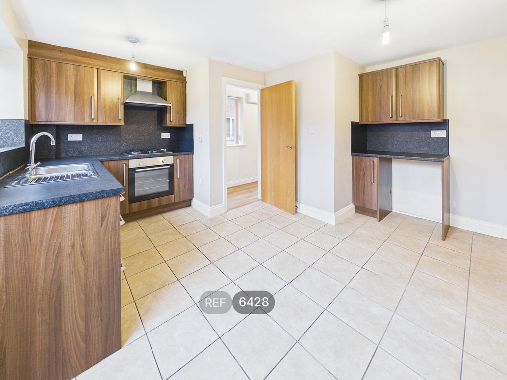 Property photo 3 of 12 Kitchen