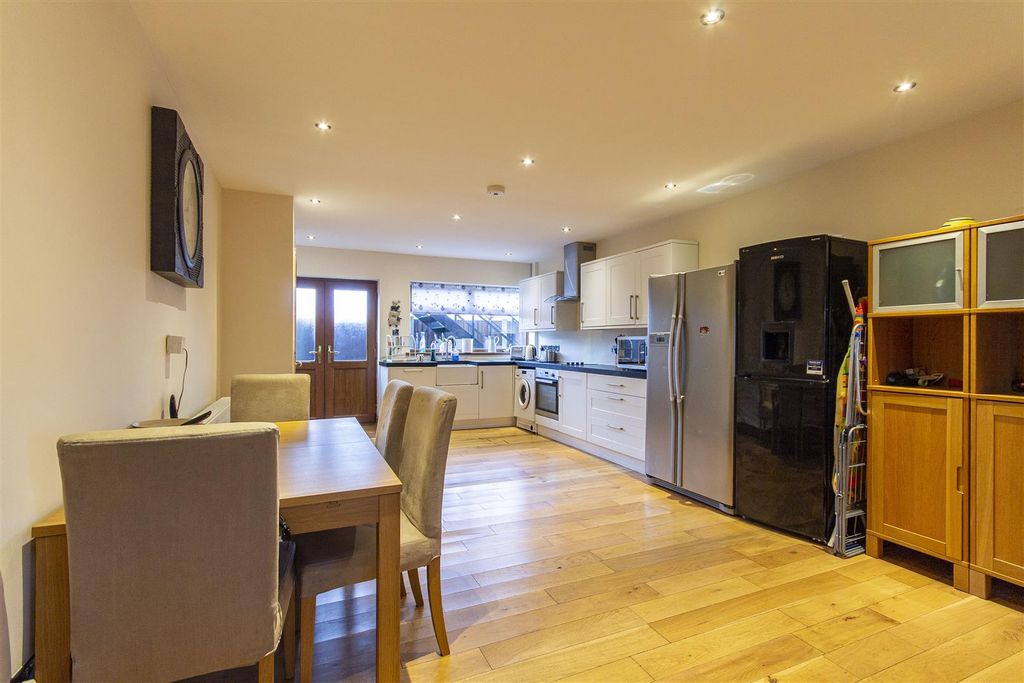 Property photo 3 of 19 Kitchen/Dining/Living Room