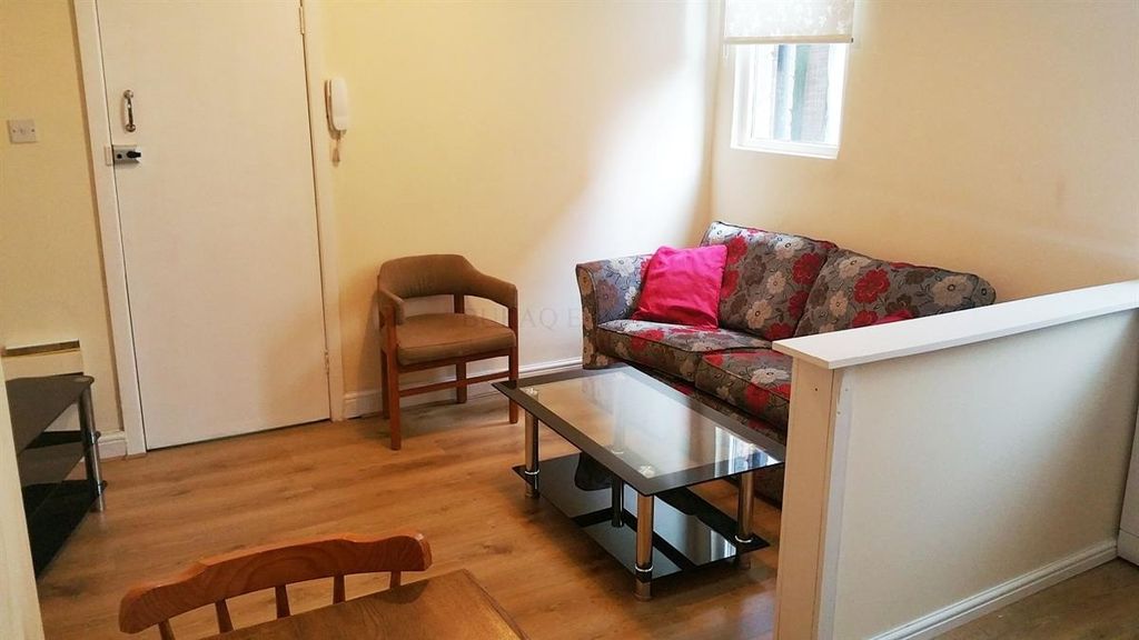 Property photo 2 of 5 Cosy Lounge With Sleek Wooden Flooring...