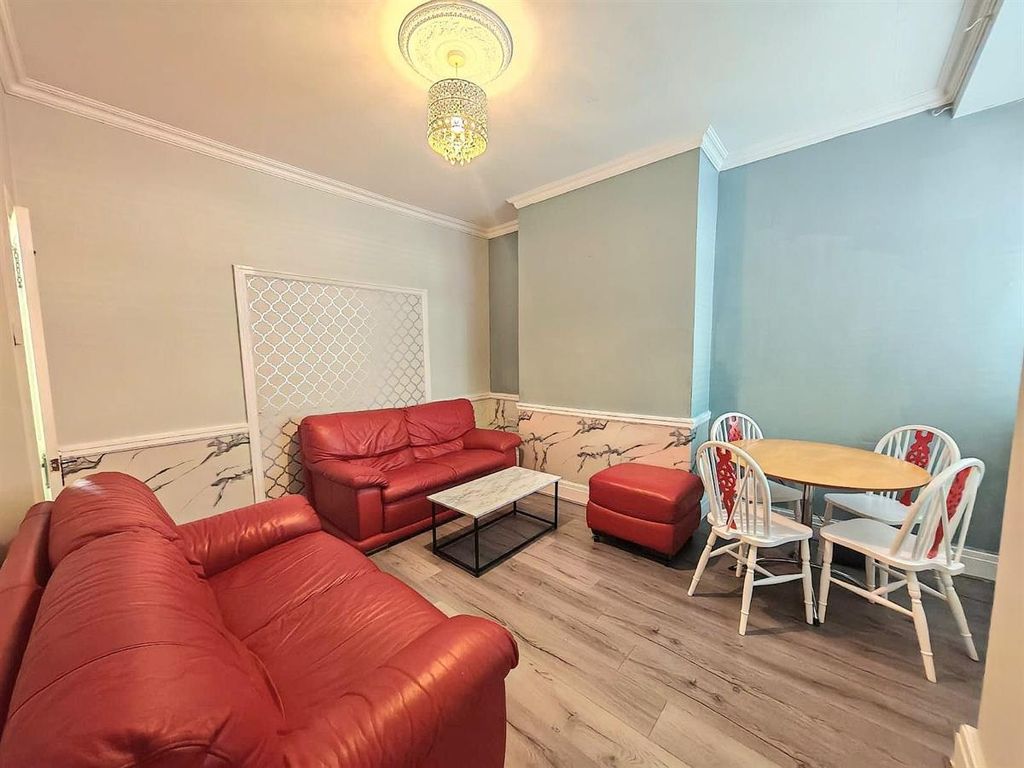 Property photo 3 of 13 Bright Lounge With Red Sofas And Dining Area...