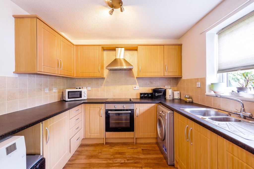 Property photo 3 of 7 Kitchen