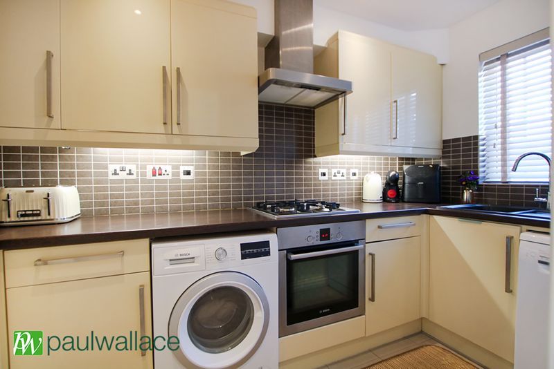 Property photo 3 of 12 Kitchen