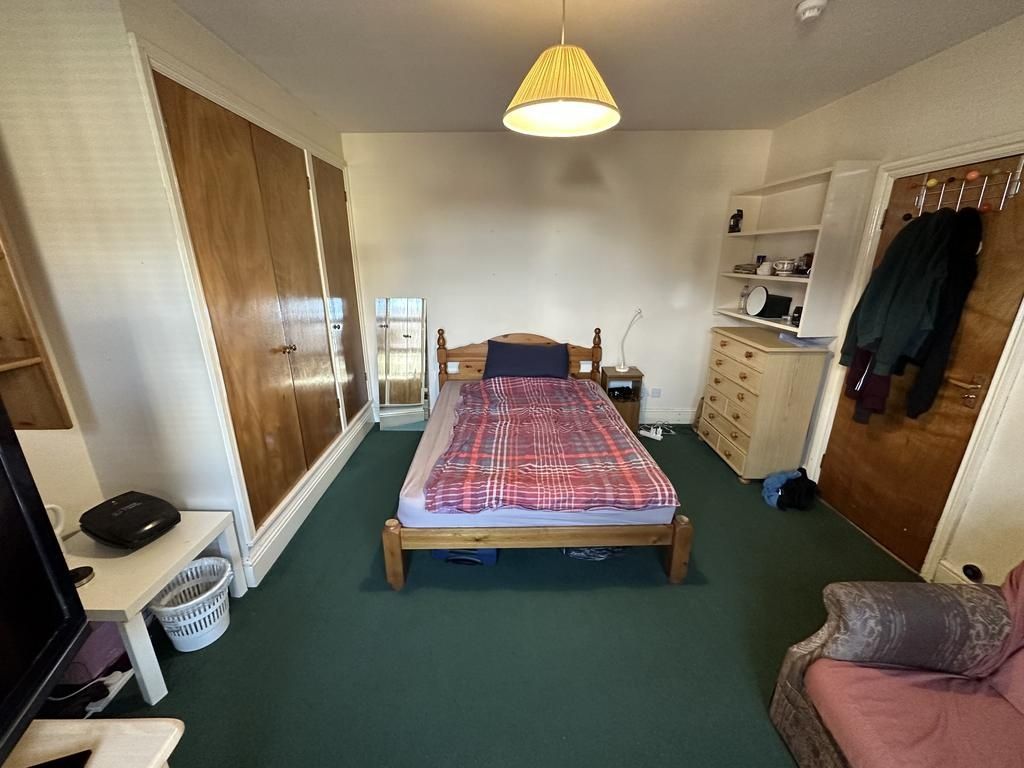 Property photo 2 of 8 Neat Bedroom With A Central Wooden Double Bed, Bui...