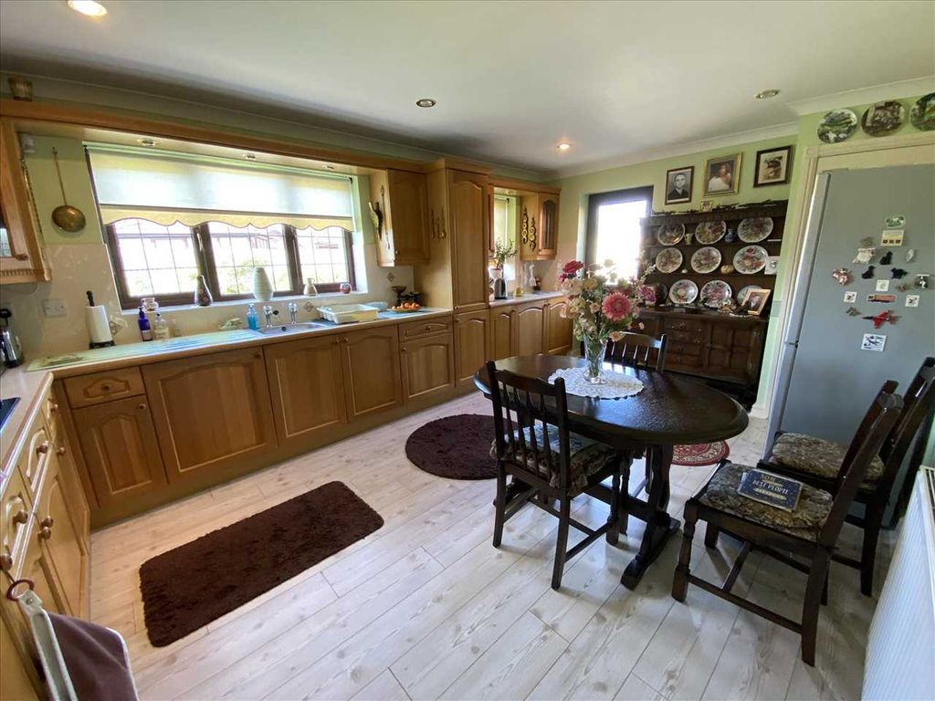 Property photo 3 of 12 Dining Kitchen: