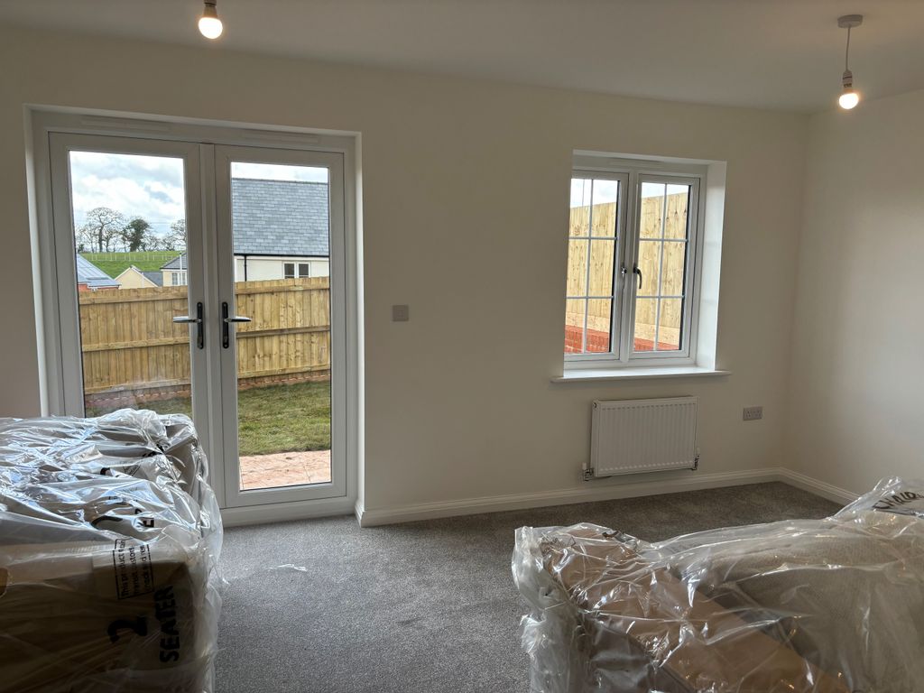 Property photo 3 of 12 Living