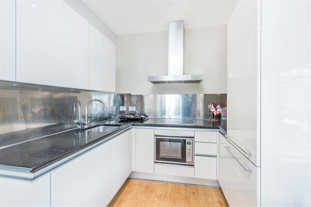 Property photo 3 of 12 Kitchen