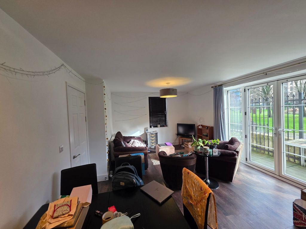 Property photo 2 of 8 Bright Open Living Room With Floor-To-Ceiling Pati...