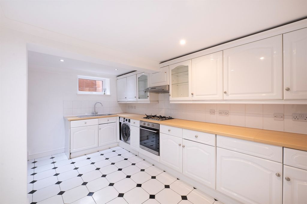 Property photo 3 of 13 Kitchen