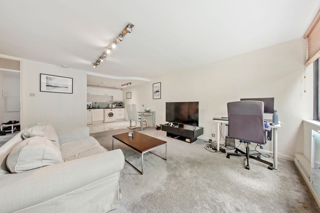 Property photo 3 of 8 Kitchen Adjoining Living Room