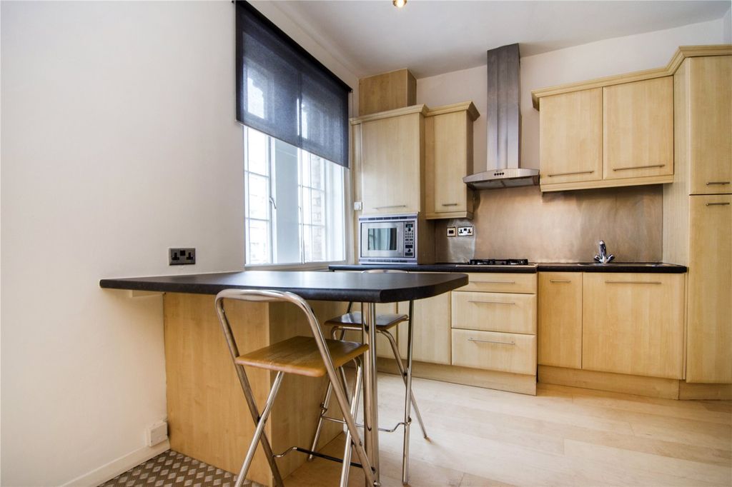 Property photo 3 of 7 Kitchen