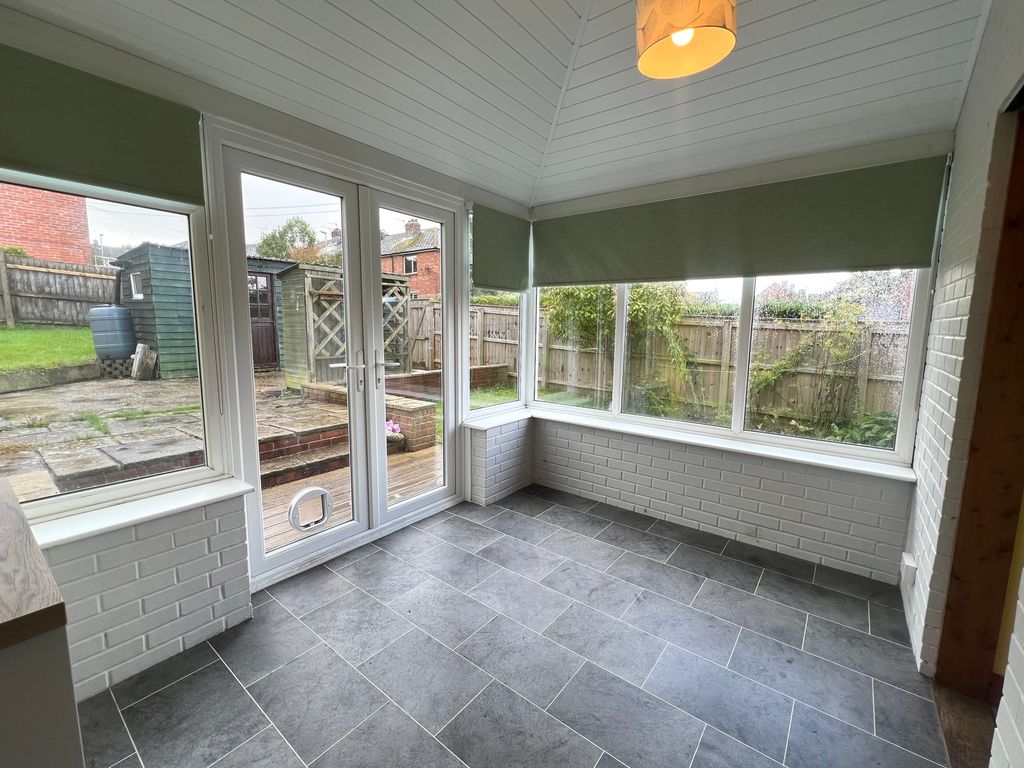 Property photo 2 of 12 Conservatory