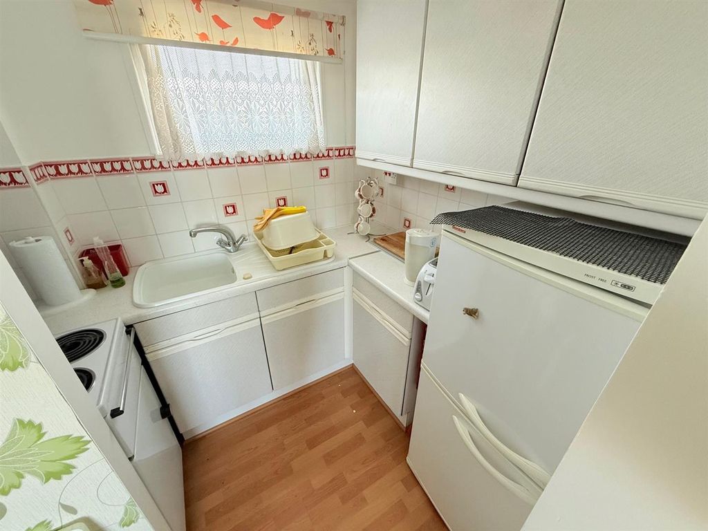 Property photo 3 of 9 Kitchen Area