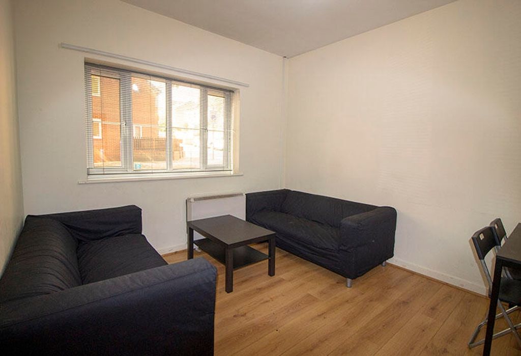 Property photo 1 of 6 A Cozy Living Room Featuring Comfortable Seating W...