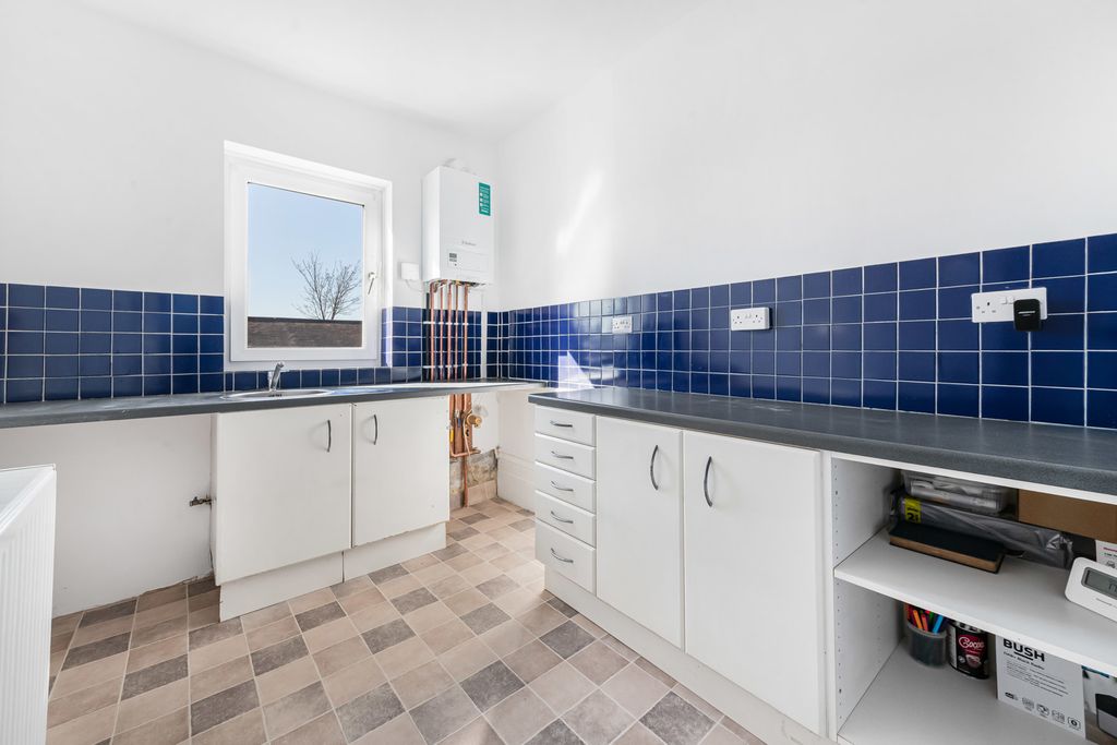 Property photo 3 of 16 Kitchen