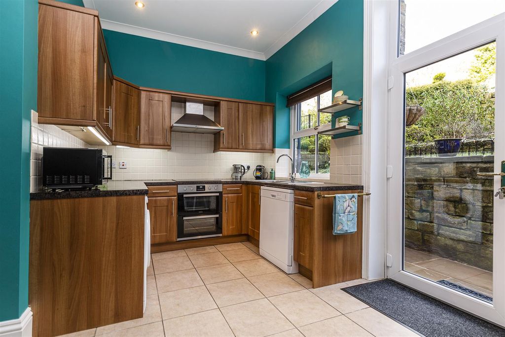 Property photo 3 of 23 L-Shaped Dining Kitchen