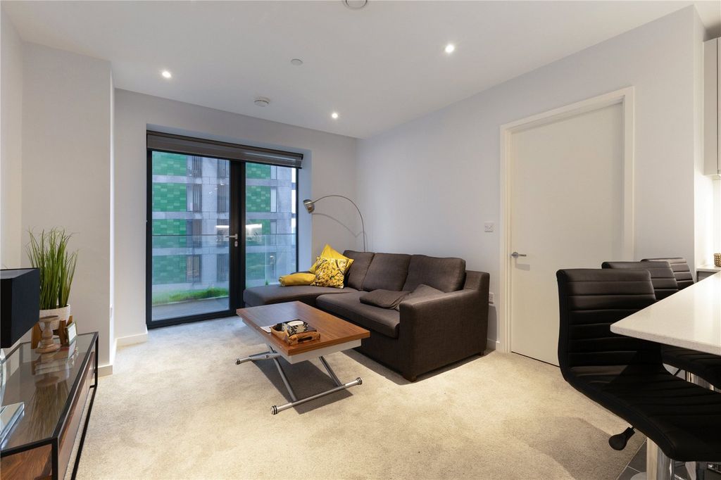 Property photo 3 of 17 Living Area