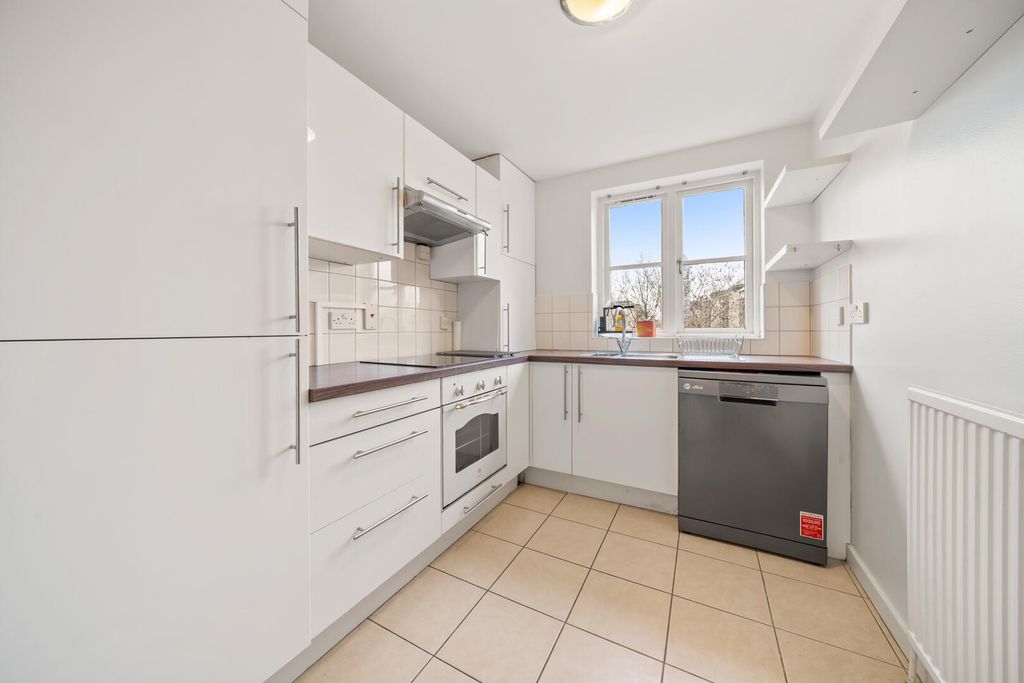 Property photo 3 of 16 Kitchen