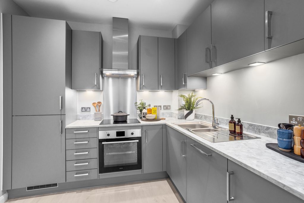 Property photo 2 of 11 Typical Kitchen