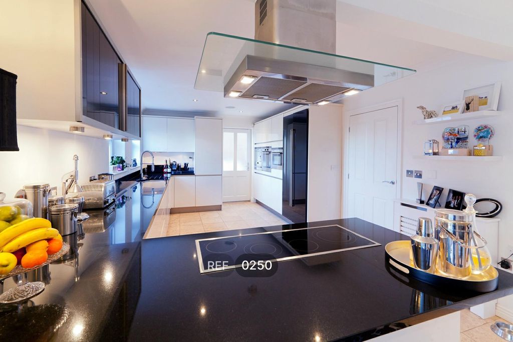 Property photo 3 of 13 Kitchen & Living Room