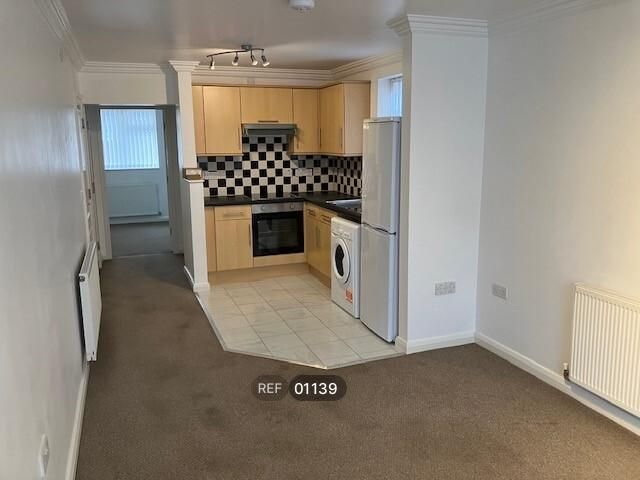 Property photo 3 of 7 Kitchen/Living Area