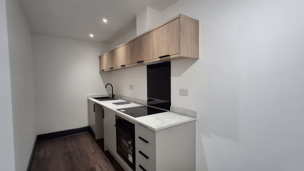 Property photo 1 of 8 Kitchen