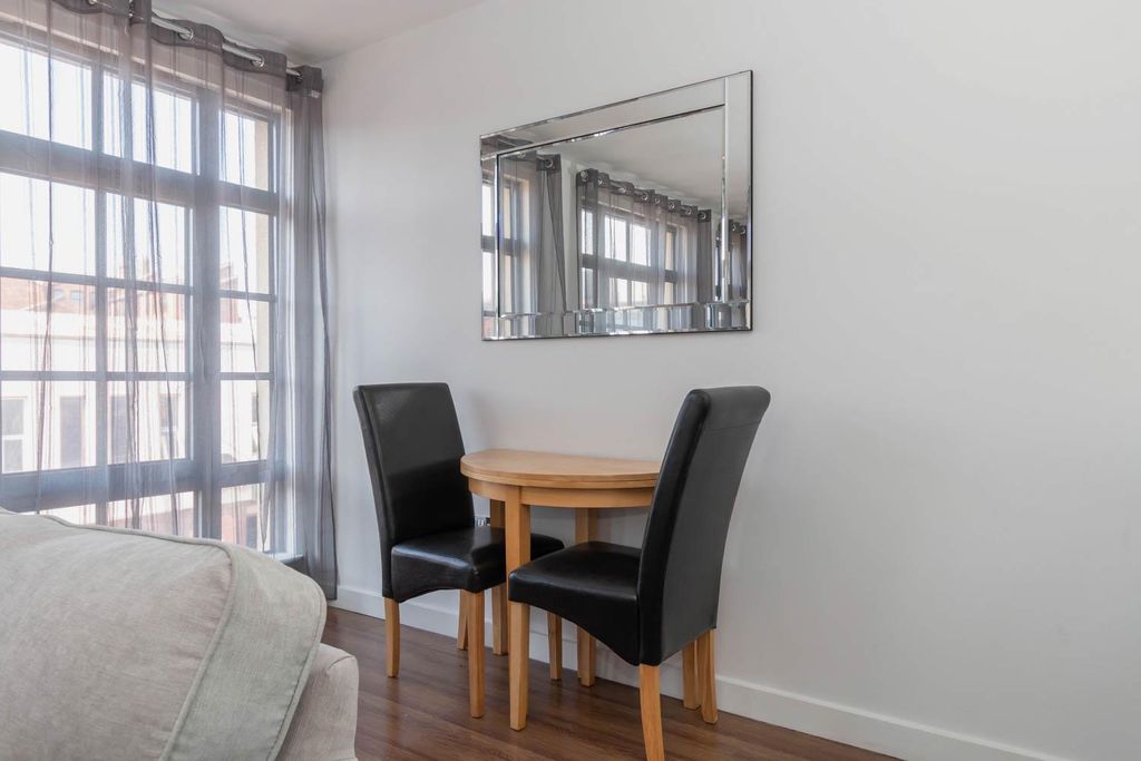 Property photo 3 of 15 Living Area