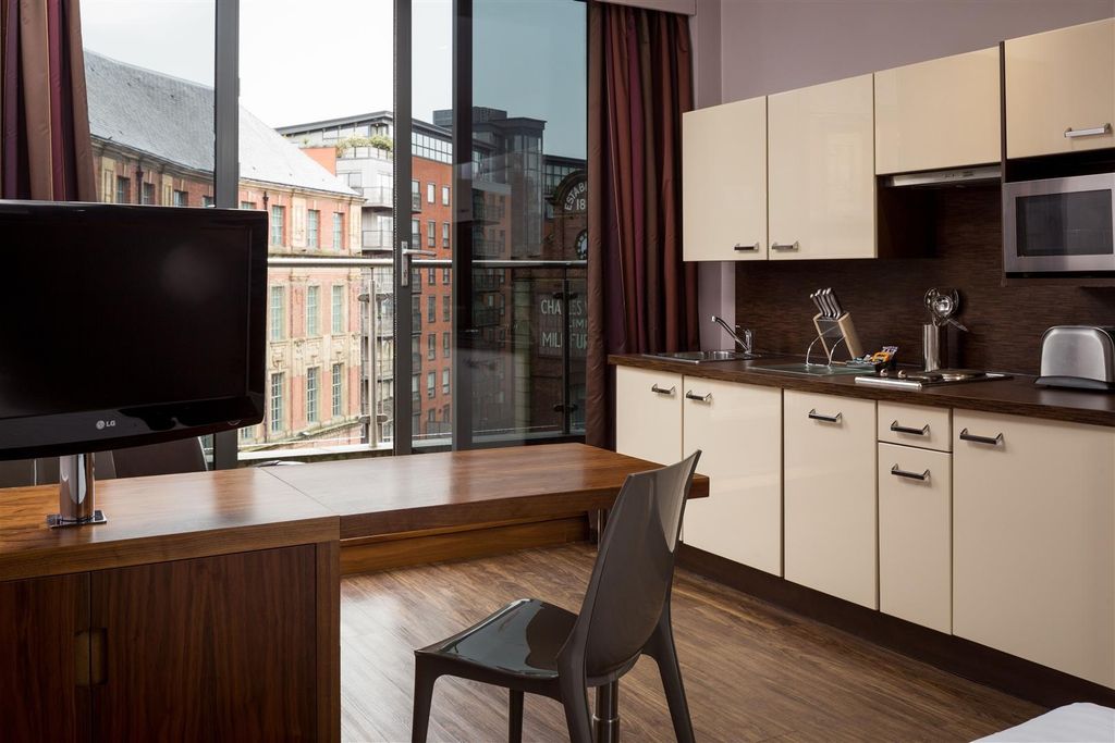 Property photo 2 of 5 Modern Kitchenette In A City Apartment With Sleek ...