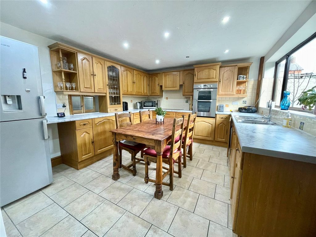 Property photo 3 of 24 Dining Kitchen