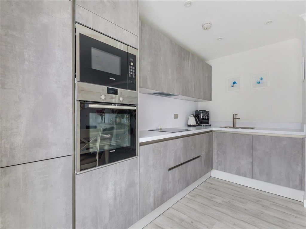 Property photo 1 of 11 Kitchen Area