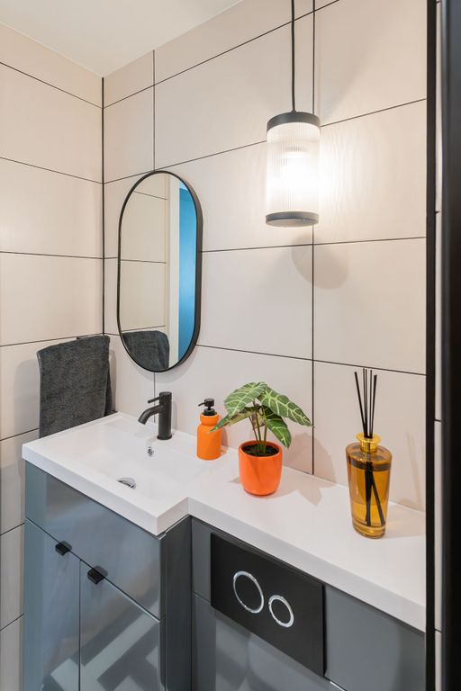 Property photo 1 of 7 A Modern Bathroom With Clean White Tiled Walls And...