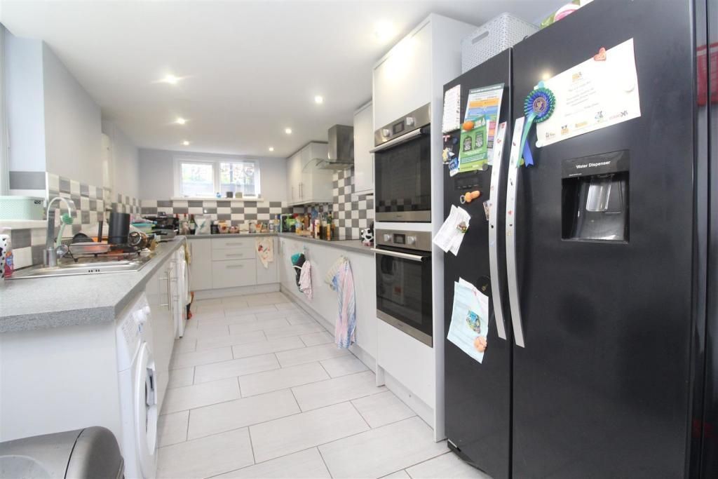 Property photo 1 of 12 Modern Kitchen With Large Fridge And Sleek Ovens...