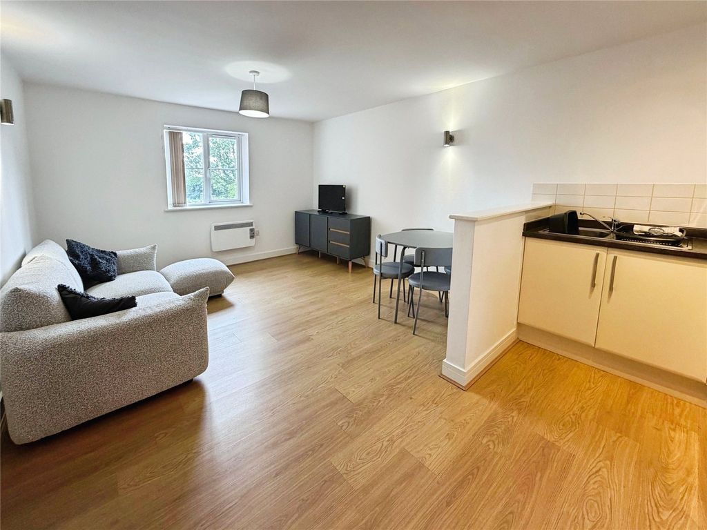 Property photo 3 of 14 Living/Dining Area