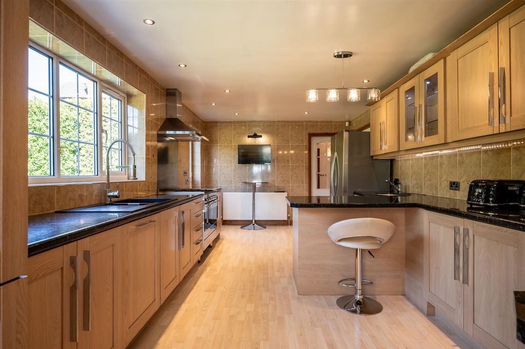 Property photo 2 of 56 Dining Kitchen