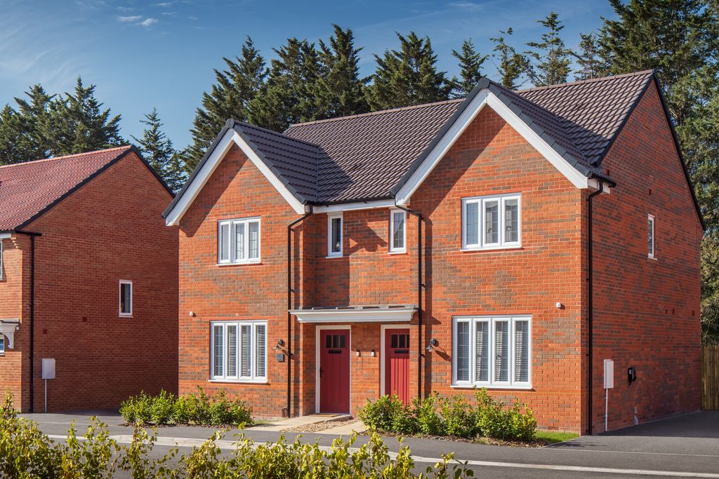 Property photo 2 of 11 A Pair Of Modern Brick Semi-Detached Houses With Red Doors And White-Framed Windows Stand In The For