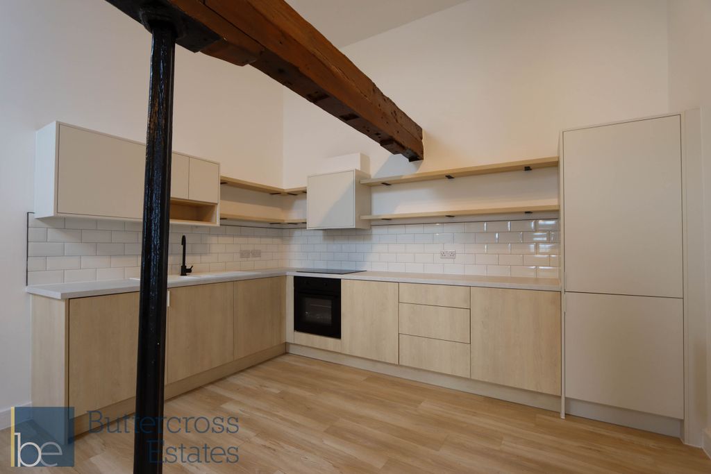 Property photo 3 of 12 Kitchen