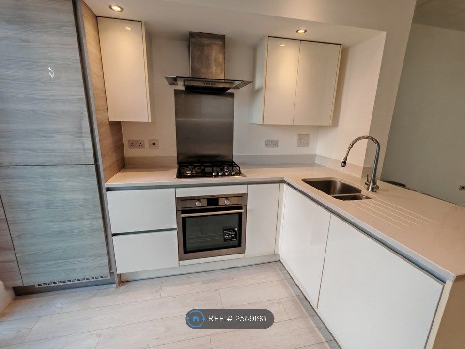 Property photo 3 of 12 Open Kitchen
