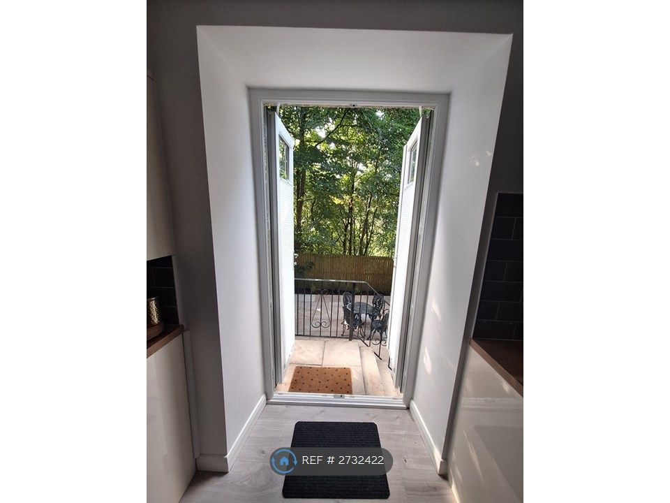 Property photo 3 of 34 Back Door Leading To Patio