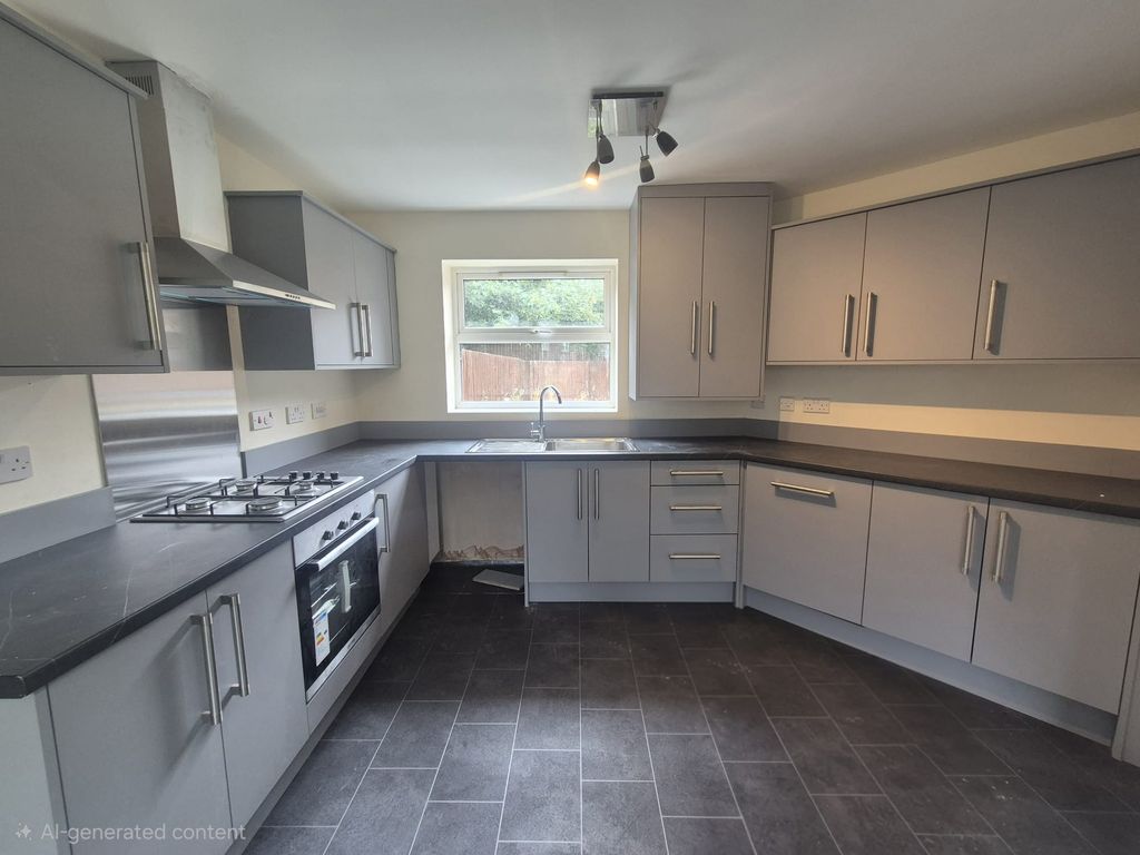 Property photo 2 of 13 Kitchen