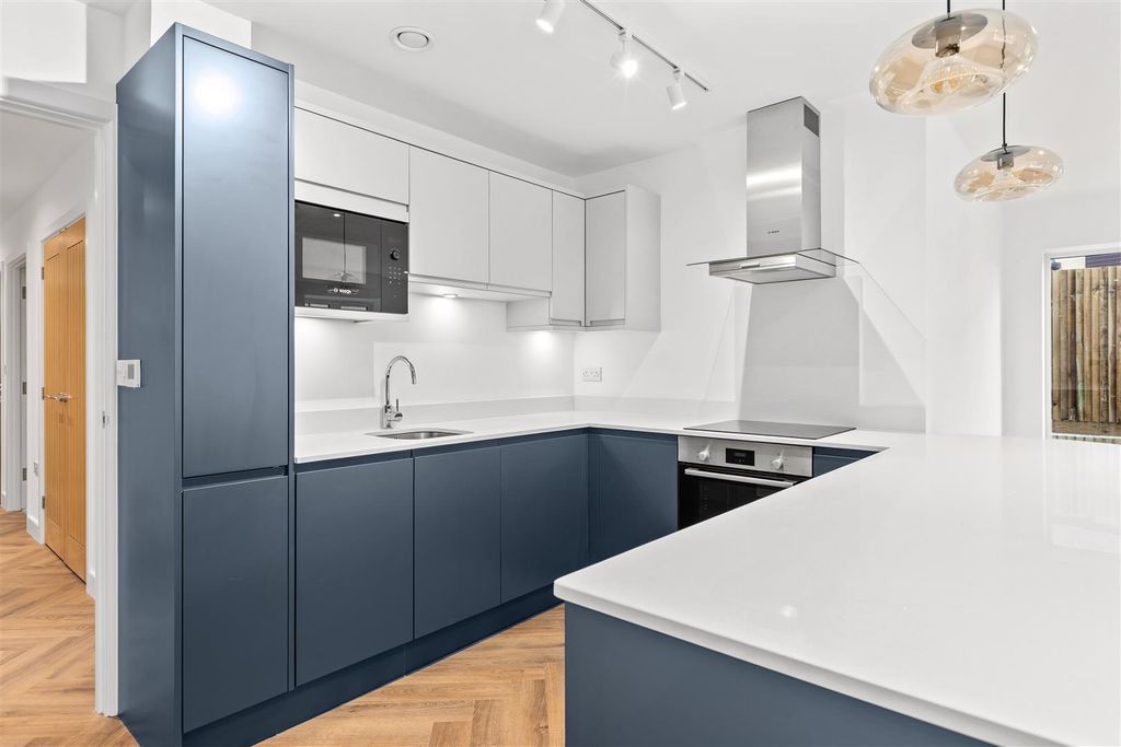 Property photo 3 of 16 Typical Kitchen