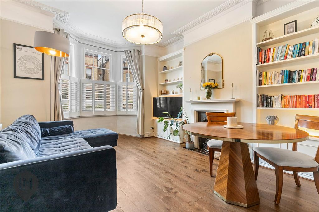 Property photo 1 of 7 Living/Dining Room