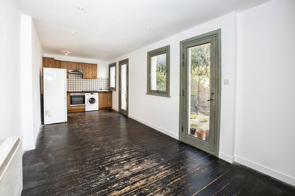 Property photo 1 of 10 Living Area