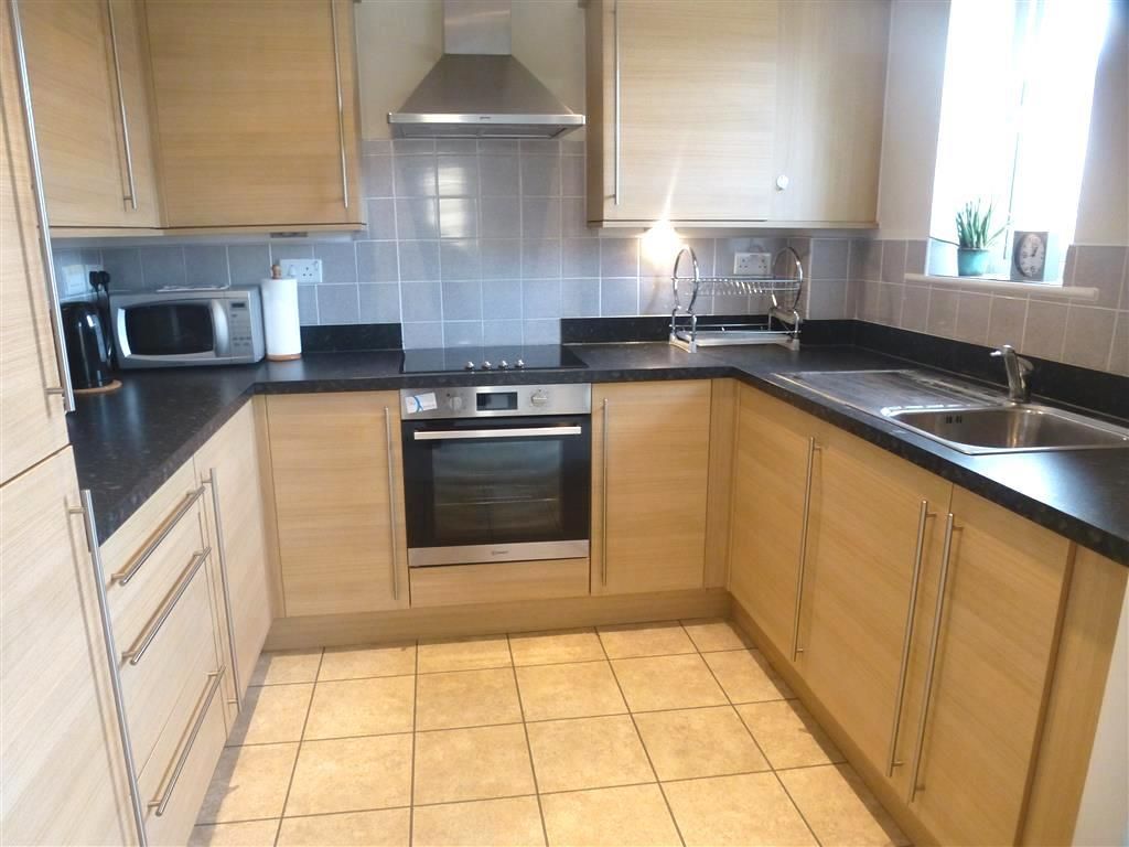 Property photo 3 of 7 Kitchen