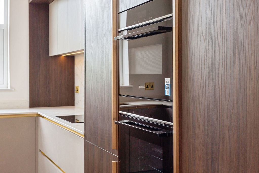 Property photo 3 of 12 Kitchen