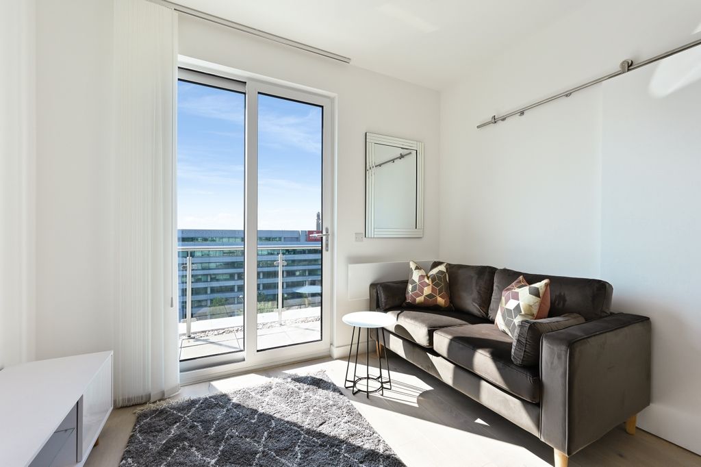 Property photo 1 of 10 Living Area