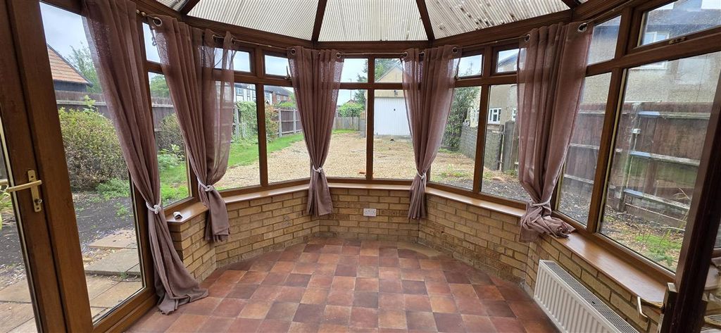 Property photo 3 of 19 Conservatory