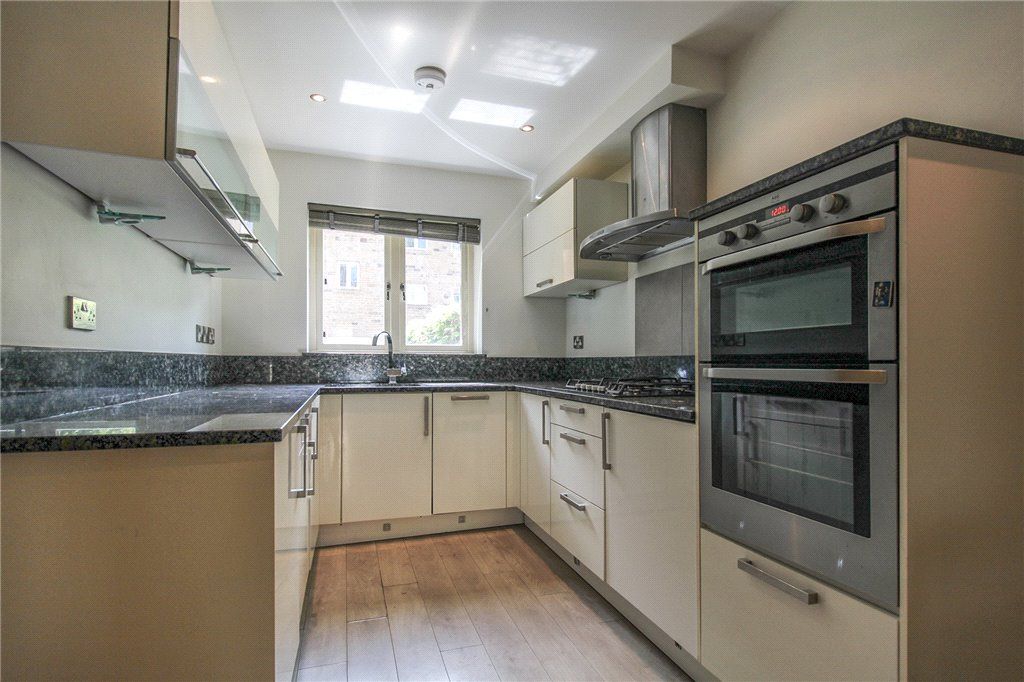 Property photo 2 of 17 Kitchen Area