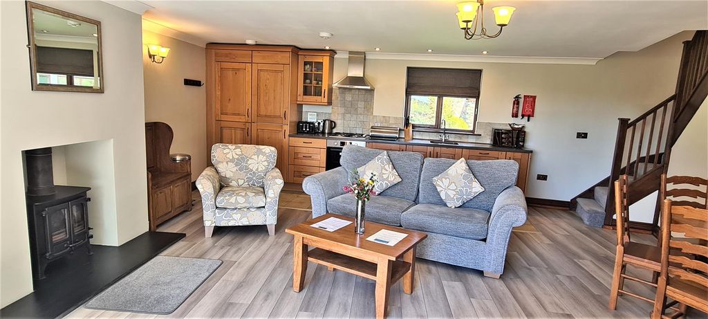 Property photo 2 of 16 Living Area (4).Jpg