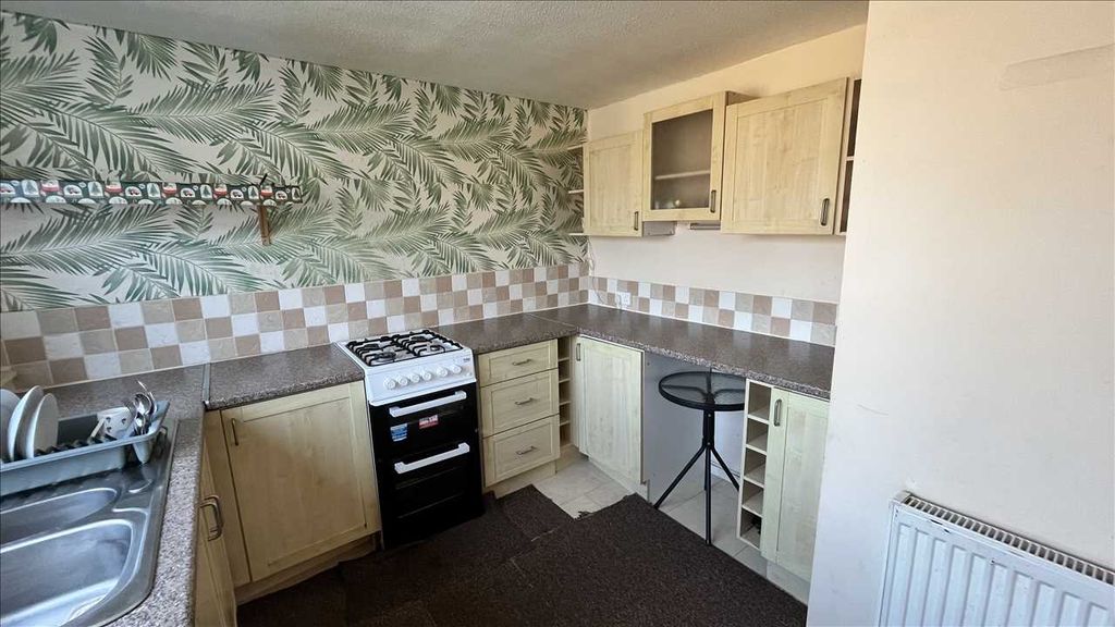 Property photo 3 of 12 Kitchen